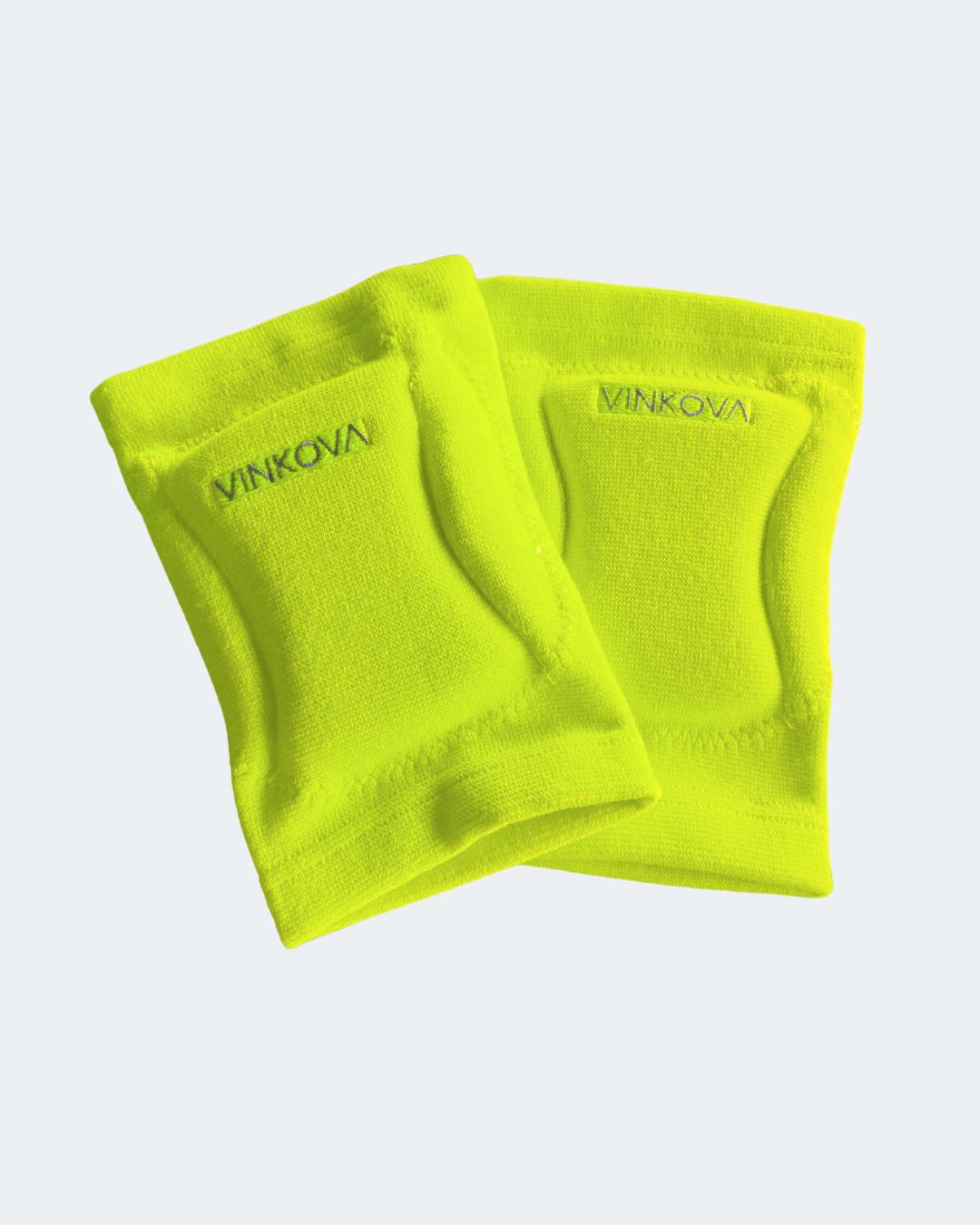 Paio di ginocchiere Vinkova, colore giallo fluo, con logo e tessuto a coste.