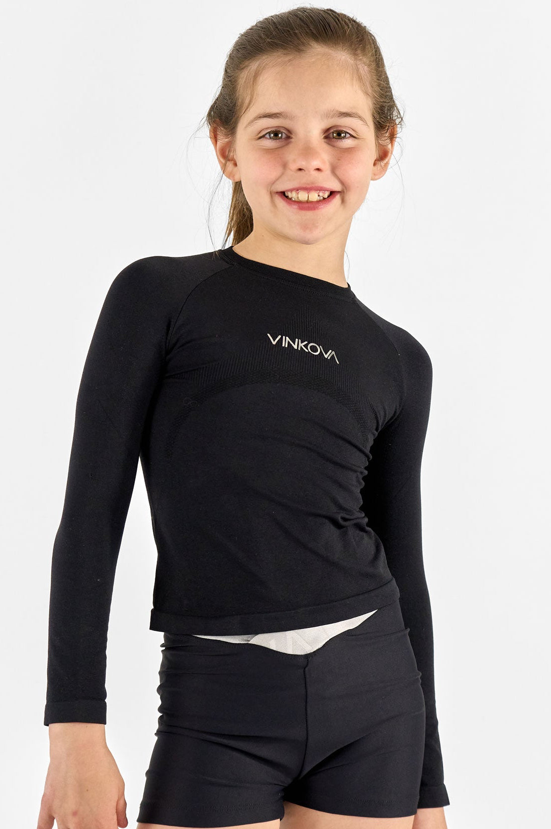 Camiseta termica para gimnasia ritmica en invierno color negro.