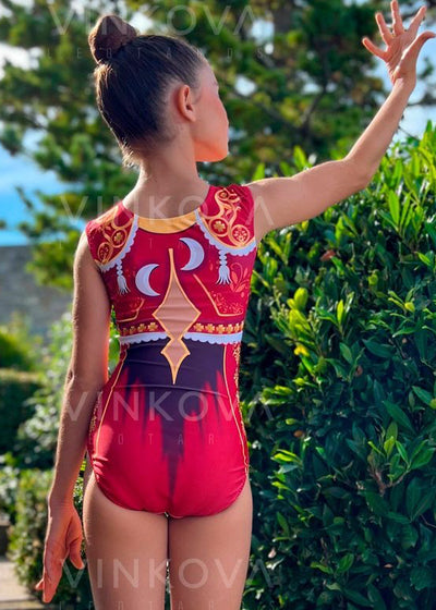 Body da ginnastica ritmica senza maniche in colore granata con design da torero e base color nudo per l'allenamento artistico
