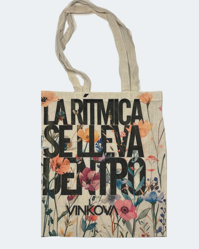 Borsa tote Vinkova a fiori con lo slogan spagnolo del marchio, vista completa.